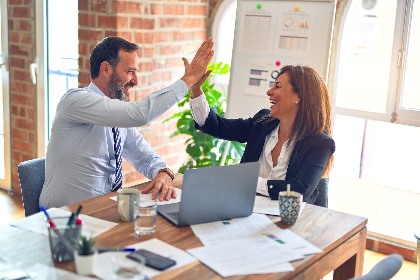 A Kodelock consultation ending in a high-five